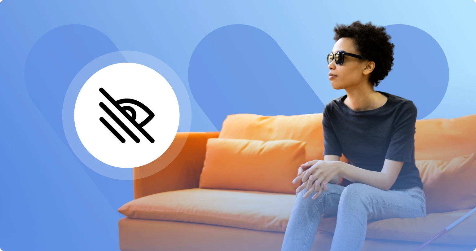 Close-up of a woman with sunglasses and a white cane sitting on an orange sofa, with a visual impairment icon on a blue background.